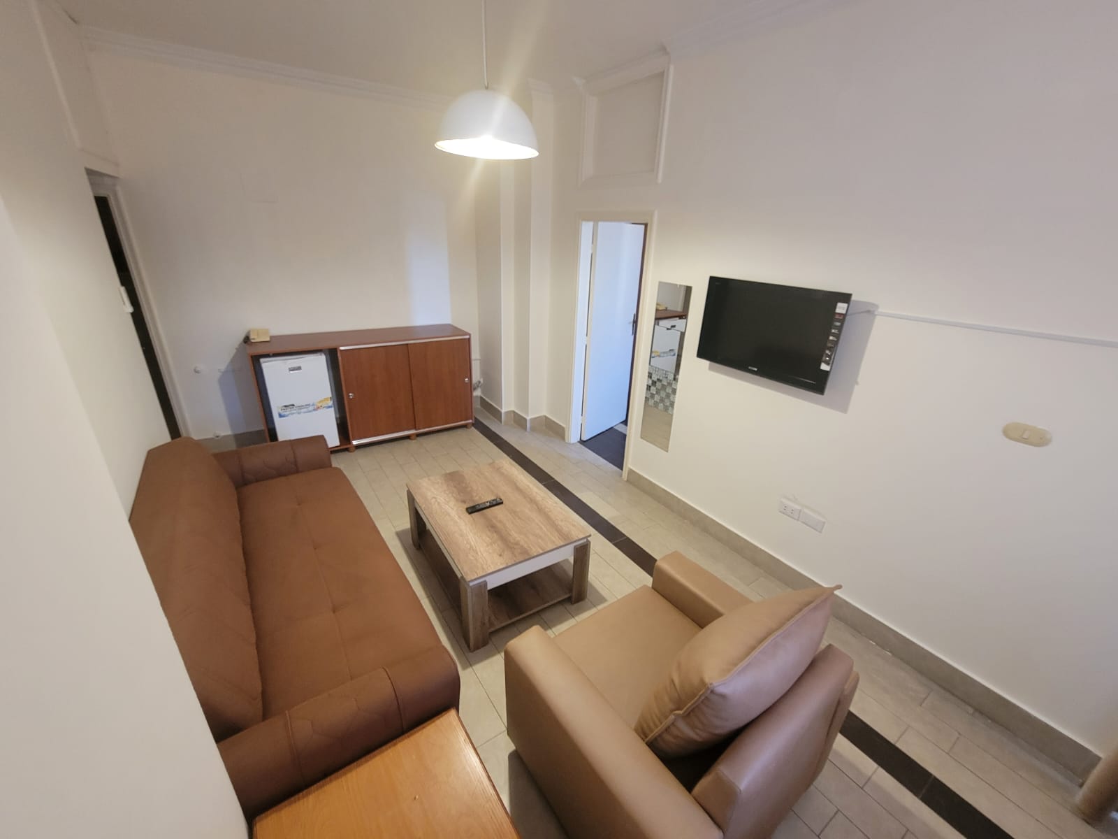 Classic Suite — sitting room with television