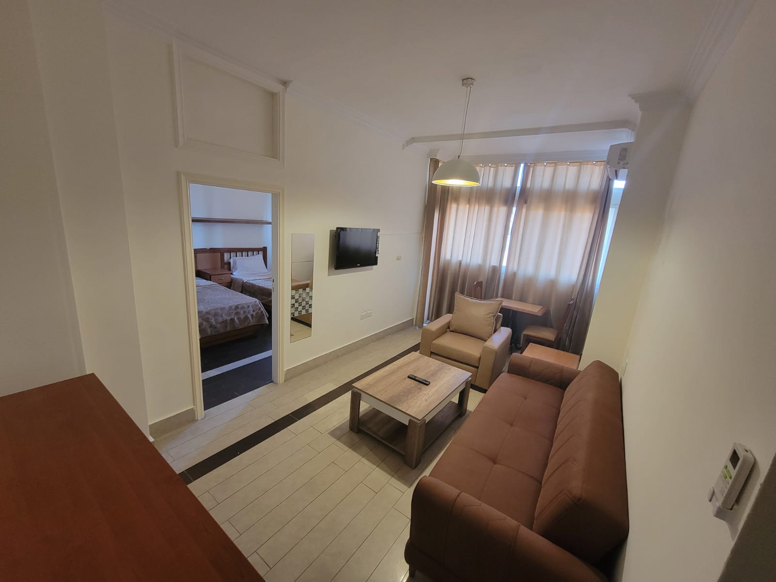 Classic Suite — sitting room toward the bedroom