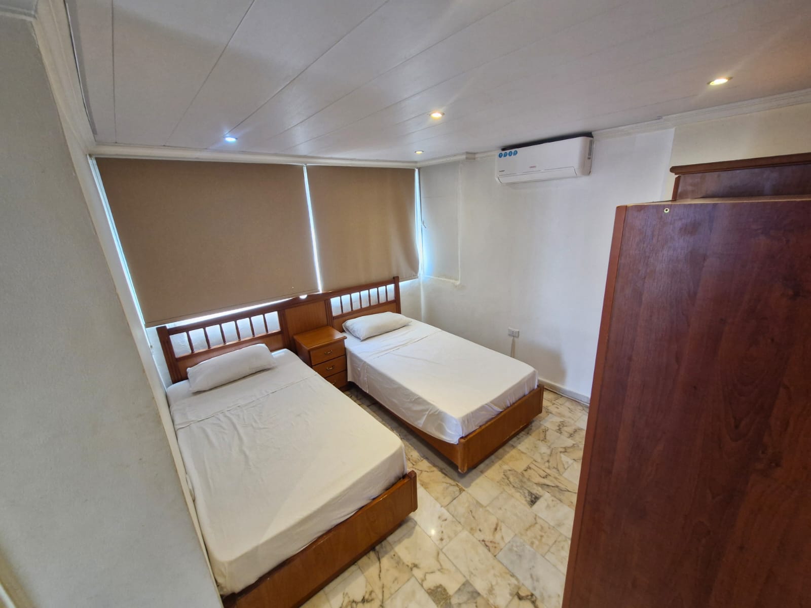 Royal Suite A — bedroom with twin beds